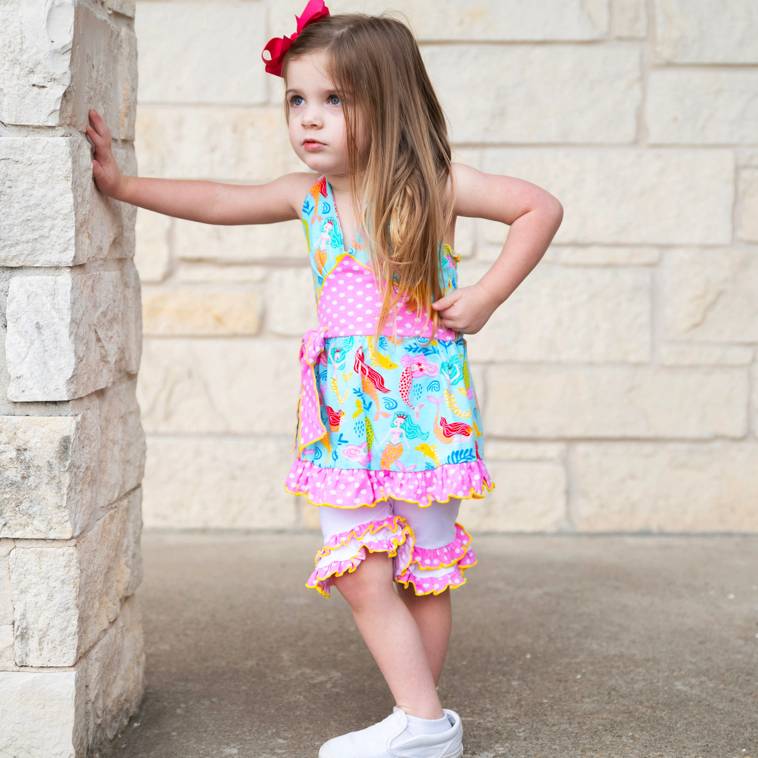 AnnLoren Girls Mermaid Halter Dress featuring a pink polka dot waistband and big bow, paired with white ruffle shorts, perfect for summer wear.